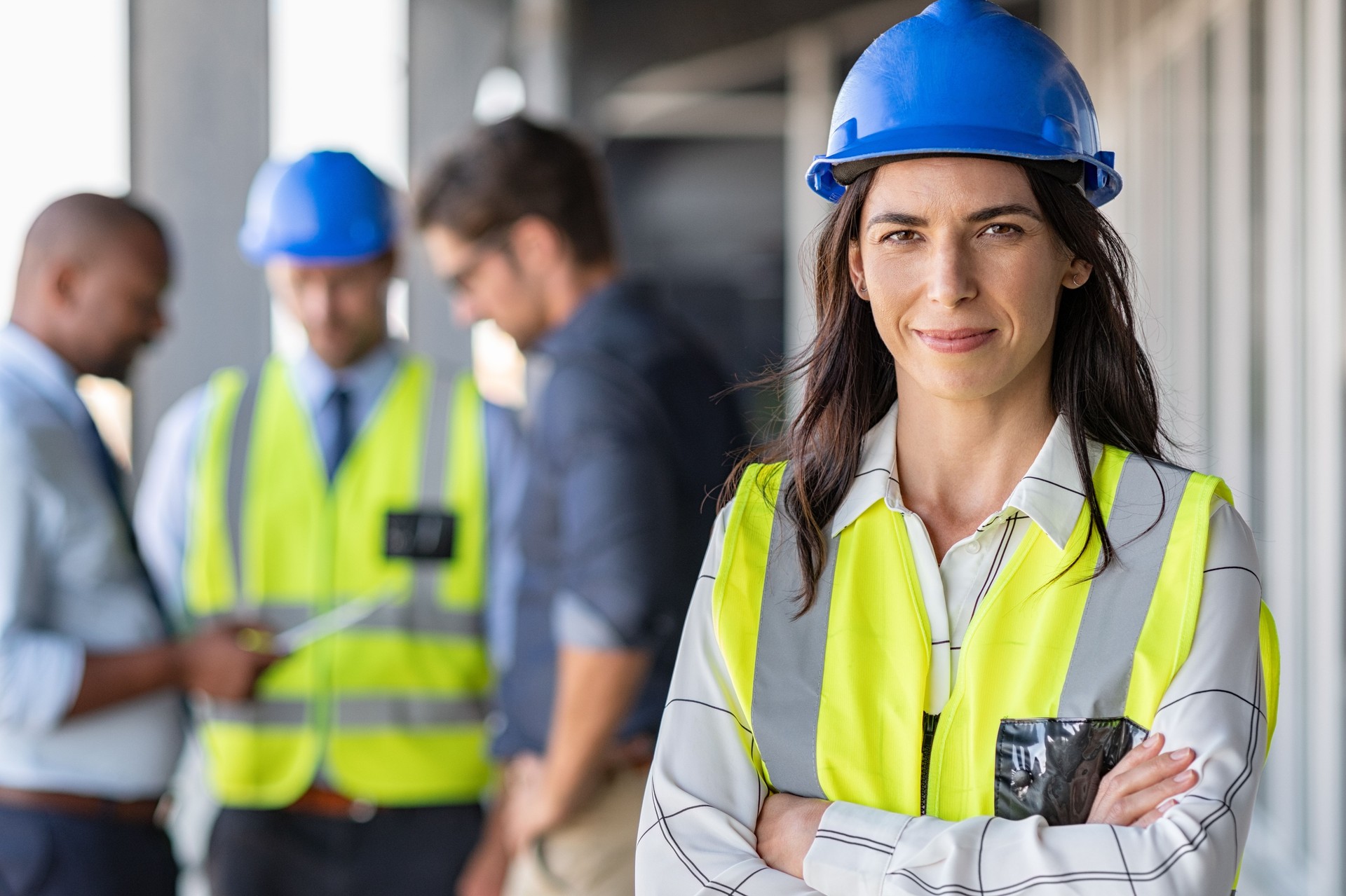 Confident architect at construction site